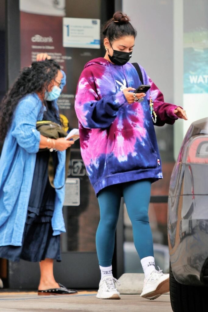 iVanessa Hudgens: Bright pink leggings and oversized tie-dye hoodies