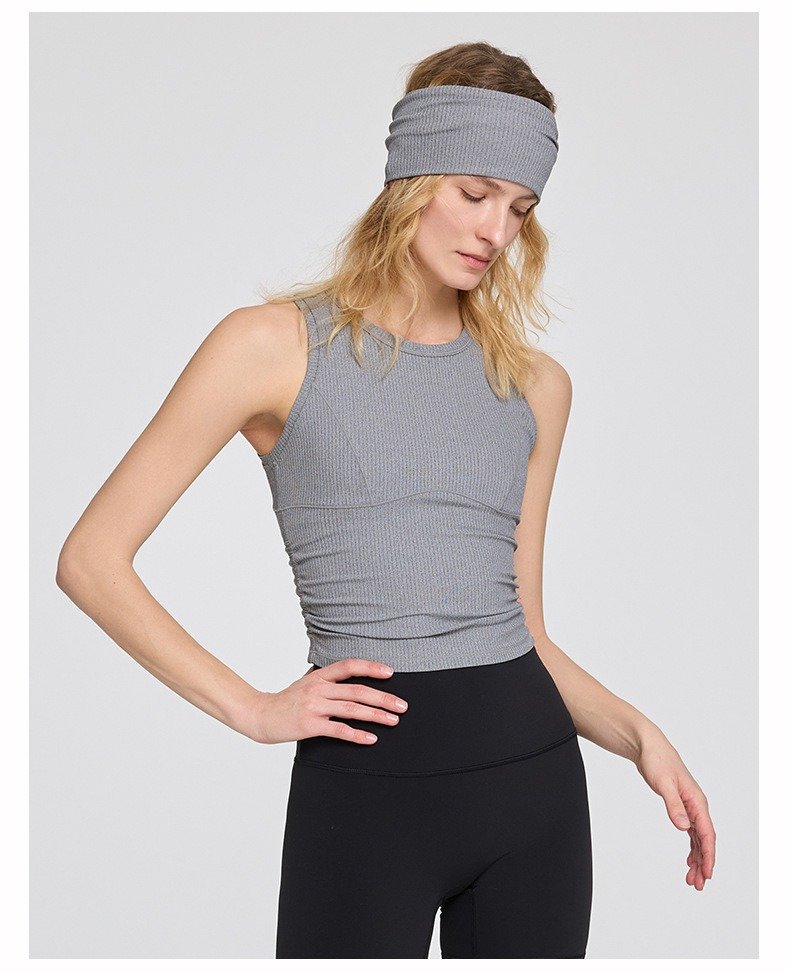 Athlete performing yoga in high-waisted leggings